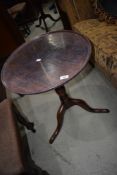 A mahogany framed tilt top tea table