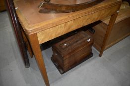A early to mid 20th Century golden oak desk or side table of small proportions