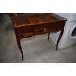 A Loius XIV style dressing/sewing/work table having lift top compartments to each side and mirror to
