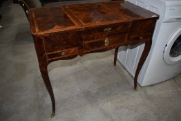 A Loius XIV style dressing/sewing/work table having lift top compartments to each side and mirror to