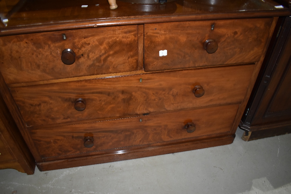 A 19th Century chest of two over two drawers, of wide proportions, possibly been a linen press