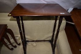 An Edwardian mahogany part nest table