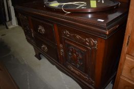 A Victorian sideboard with copper handles