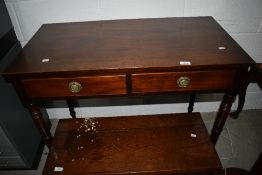 A late Victorian side or hall way table with drawer front