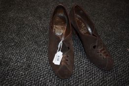 A pair of 1940s brown suede shoes having cut work an leather soles ' Made by Bective, Vernon Humpage