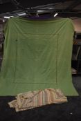 Two late 19th early 20th century bed coverlets, one lime green with embroidery and cut work, and the