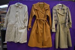 Three ladies vintage macs or overcoats.