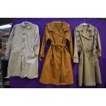 Three ladies vintage macs or overcoats.