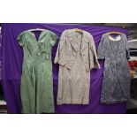 Three 1950s and 60s dresses, including pale green satin gown.