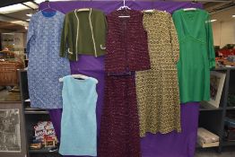 A mixed lot of ladies 1960s clothing including skirt suit and dresses, cheerful festive fabrics!