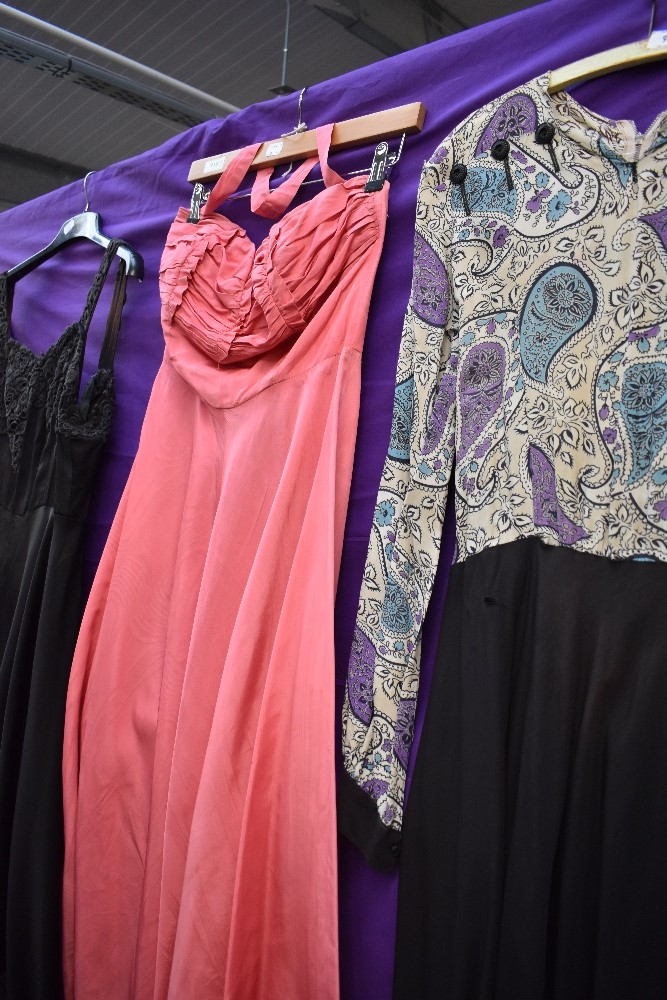 Four 1940s and 1950s gowns, mixed sizes and colours, zip replacement needed to one pink gown. - Image 3 of 6
