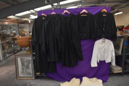 A selection of gents vintage and antique clothing including clerical gowns, naval, Scottish