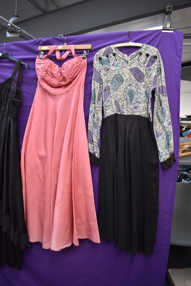 Four 1940s and 1950s gowns, mixed sizes and colours, zip replacement needed to one pink gown. - Image 2 of 6