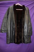 A 1980s soft leather coat having ranch mink lining.