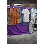 Eight ladies vintage and retro dresses, medium sizes, mixed styles.