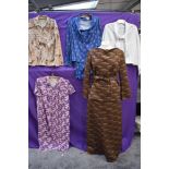 A mixed lot of ladies 1970s clothing including blouse, skirt suit and dresses.