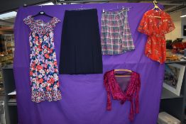 A mixed lot of ladies vintage clothing including 1940s skirt, 70s angel sleeve blouse and velvet