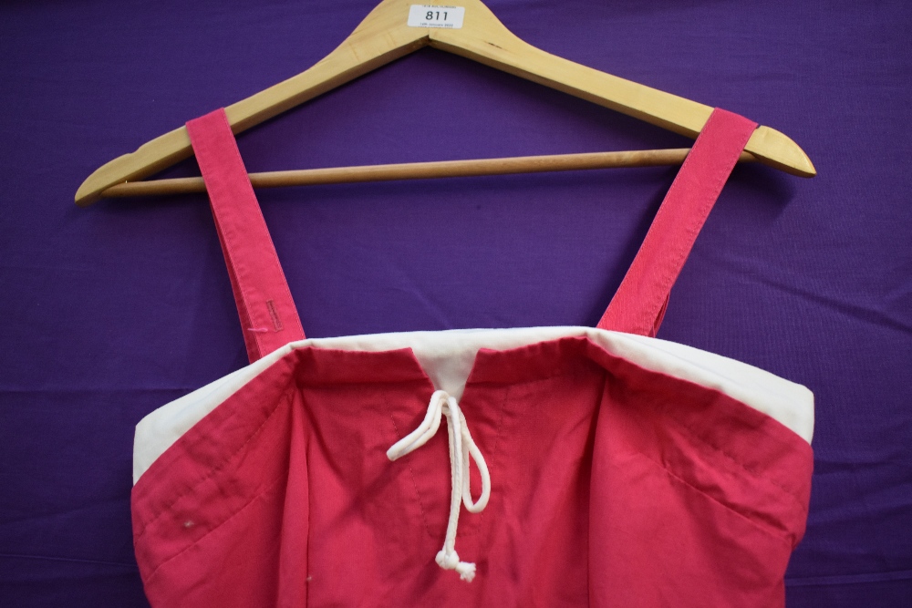 A 1950s Cerise and white cotton playsuit having pockets to front and button fastening to back. - Image 3 of 4