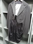 A gents vintage black tailcoat with grey waistcoat, around 1950s.