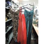 Four ladies open back dresses in light fabrics