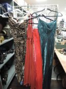 Four ladies open back dresses in light fabrics