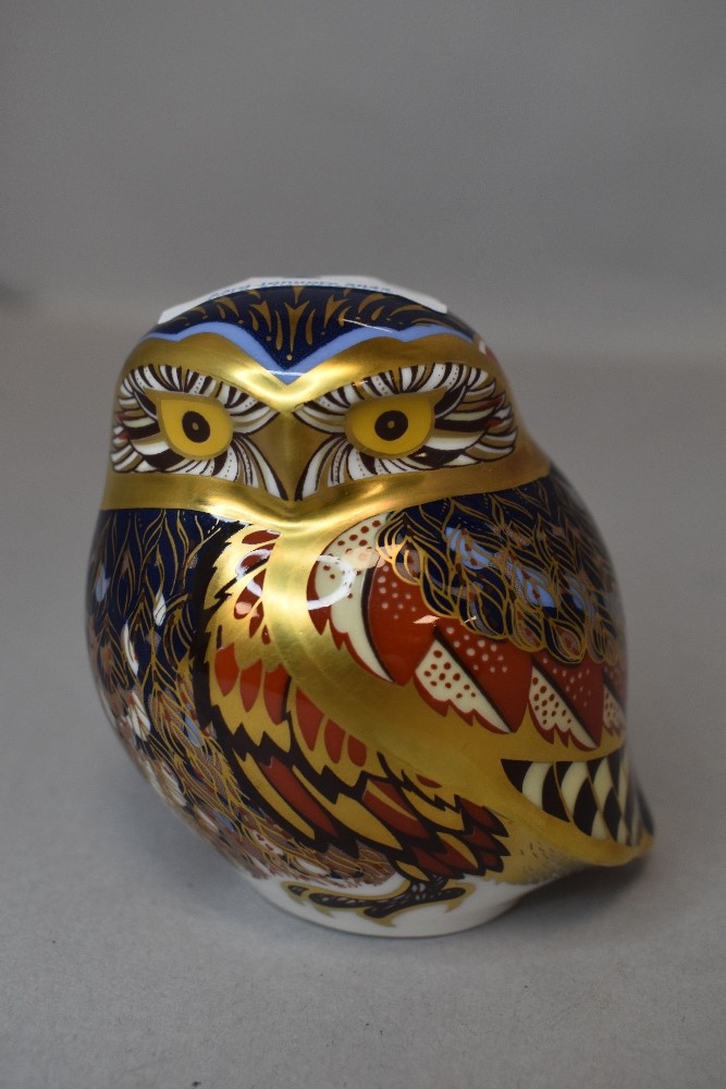 A Royal Crown Derby paper weight figure study of a little owl having gold stopper