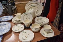 A part dinner service by Royal Doulton in the Coppice Design in good condition