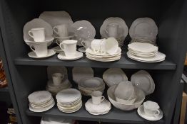 A large collection of Shelley dainty white including cups and saucers, fruit bowl, bowls, plates and