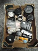 A selection of camera equipment and lens including Tokina Olympus and Pentax