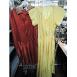 A 1940s full length yellow gown and a 1930s day dress.