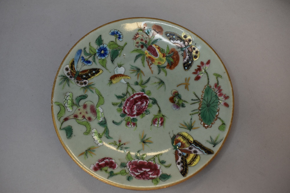A collection of seven hard paste Chinese plates in Cantonese designs painted with butterfly bird and - Bild 4 aus 21