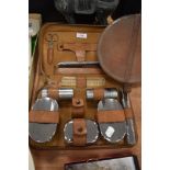 An early 20th century dress brush set and leather collar box or case