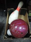 A vintage Pro Line bowling ball in pink and a matching pin