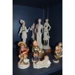 A selection of figures including Lladro and Nao