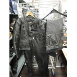 A Bellstaff motor cycle jacket and two pairs of similar leather pants