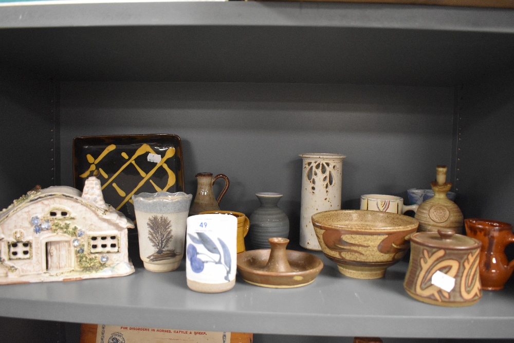 A selection of studio pottery including bowl vase and mugs etc