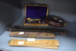 A selection of measuring rulers and tape including fold out and Constantia tape
