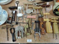 A selection of verious design corkscrews including antique examples