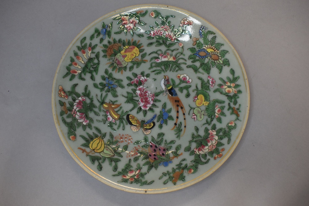 A collection of eight hard paste Chinese plates in Cantonese designs painted with butterfly bird and - Bild 6 aus 20