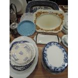 A selection of serving plates chargers and dishes including Couldon Churchill etc