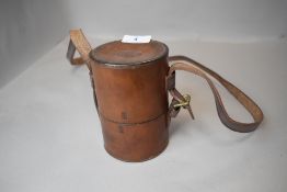 A set of hunters stirrup cups in a leather case marked Superior Warrented