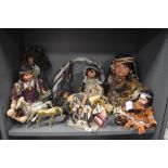 A selection of Native American dolls and figures