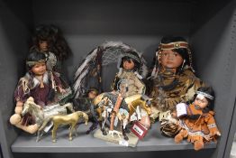 A selection of Native American dolls and figures