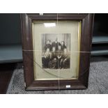 A photographic print of a Victorian family