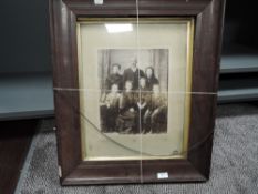 A photographic print of a Victorian family