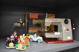 A selection of childrens toys including Lledo Noddy and miniature sewing machine