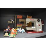 A selection of childrens toys including Lledo Noddy and miniature sewing machine