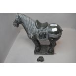 A natural stone Trojan horse or similarAF tail unattached but present.