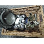 A selection of pewter including Norway and a set of lawn bowls