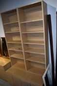 A light oak veneer laminate bookcase with double cupboard base, width approx. 112cm, depth 56cm